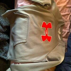 I am selling a gray and pink under armor sweatshirt